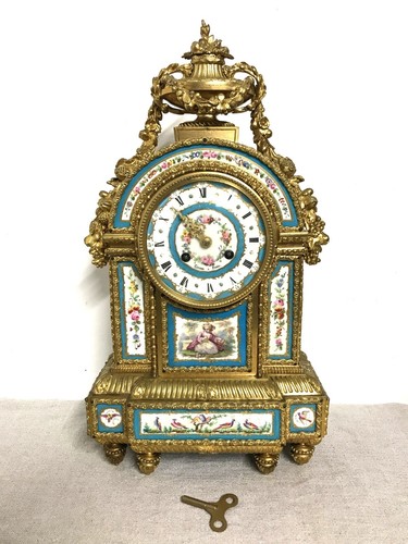 Pendule borne bronze doré - , et
